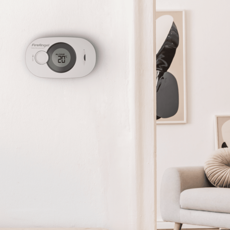 FireAngel digital display CO alarm fitted to wall inside house.